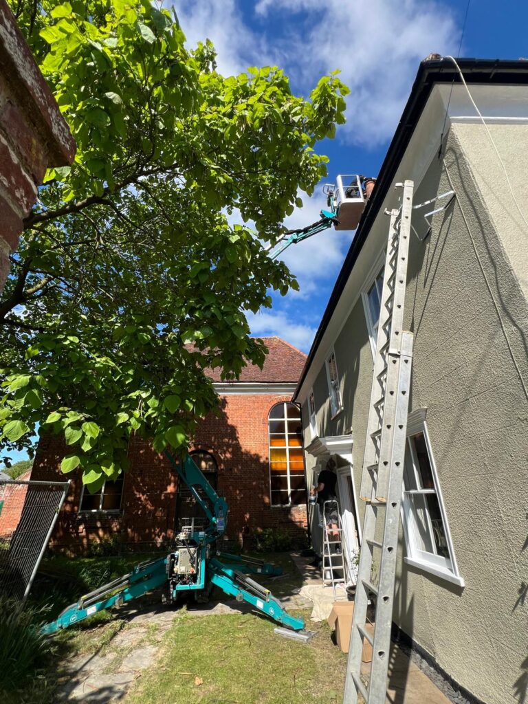 Tracked MEWP accessing chimney