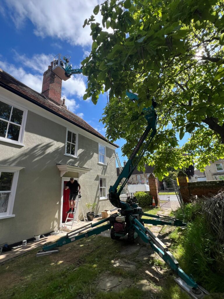 Tracked MEWP accessing chimney