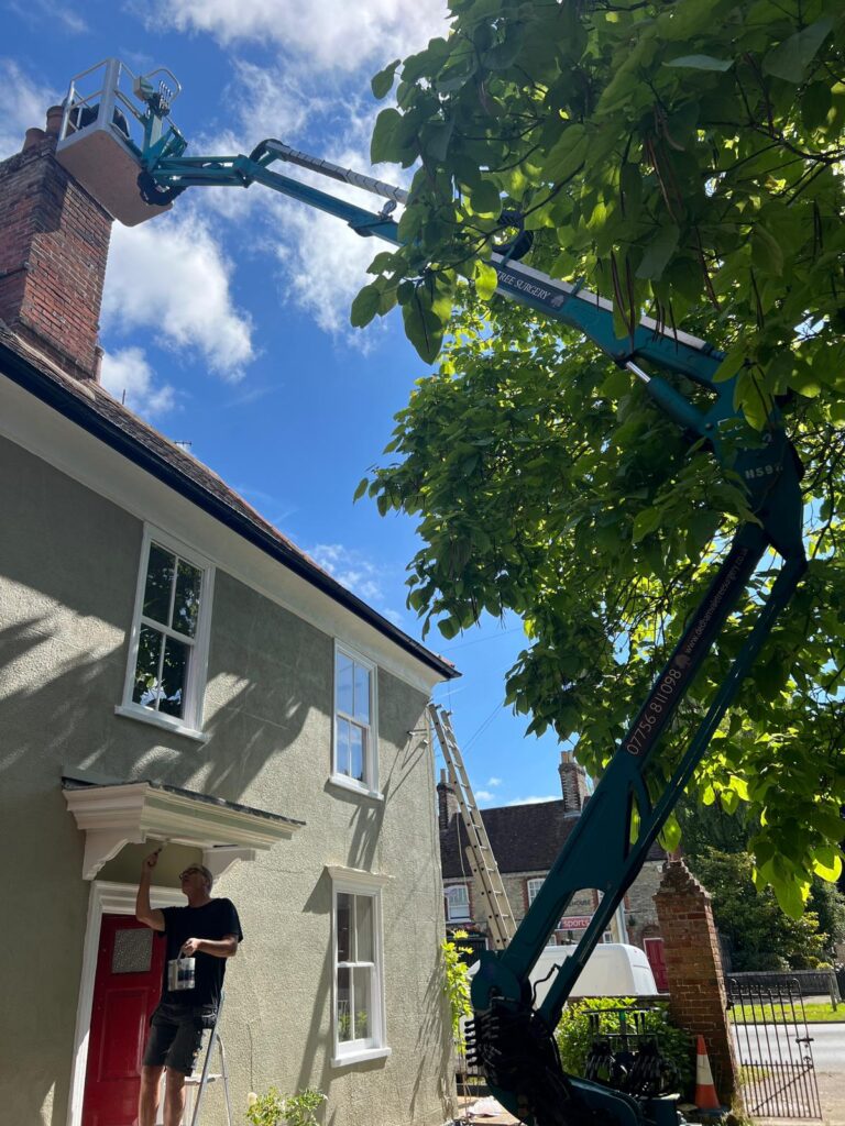Tracked MEWP accessing chimney